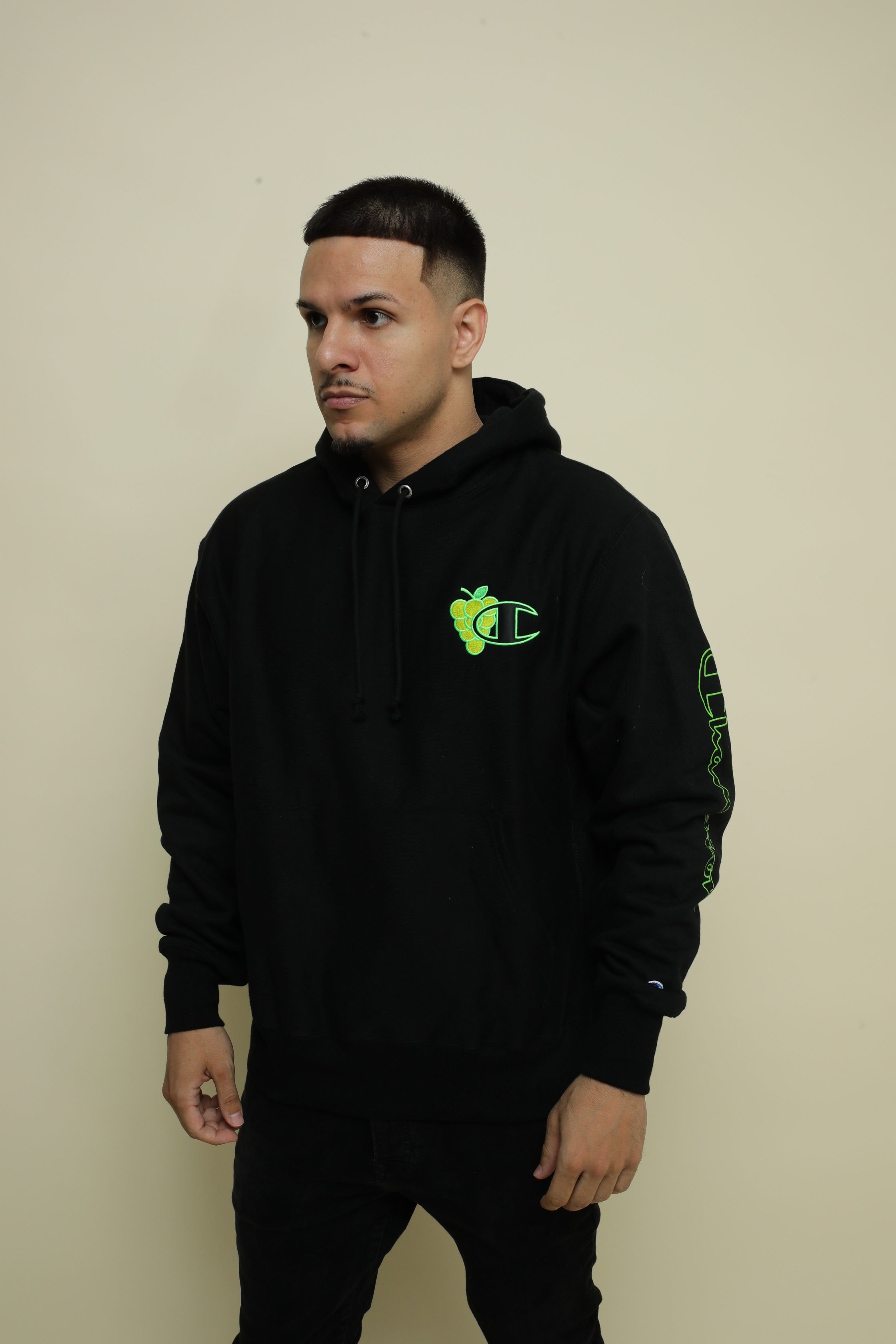 Black and green champion hoodie hotsell